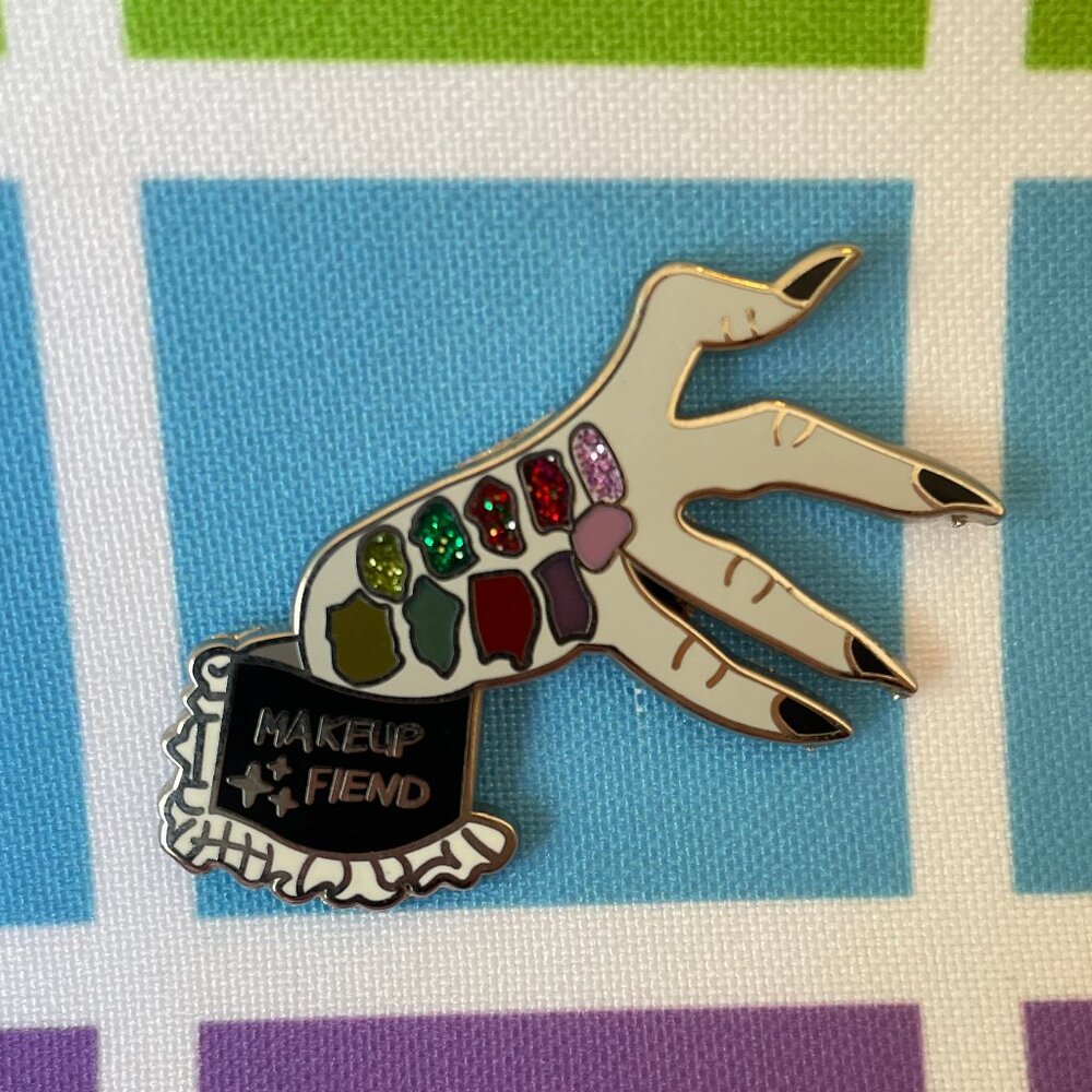 MUA horror hand glitter enamel pin Makeup Fiend